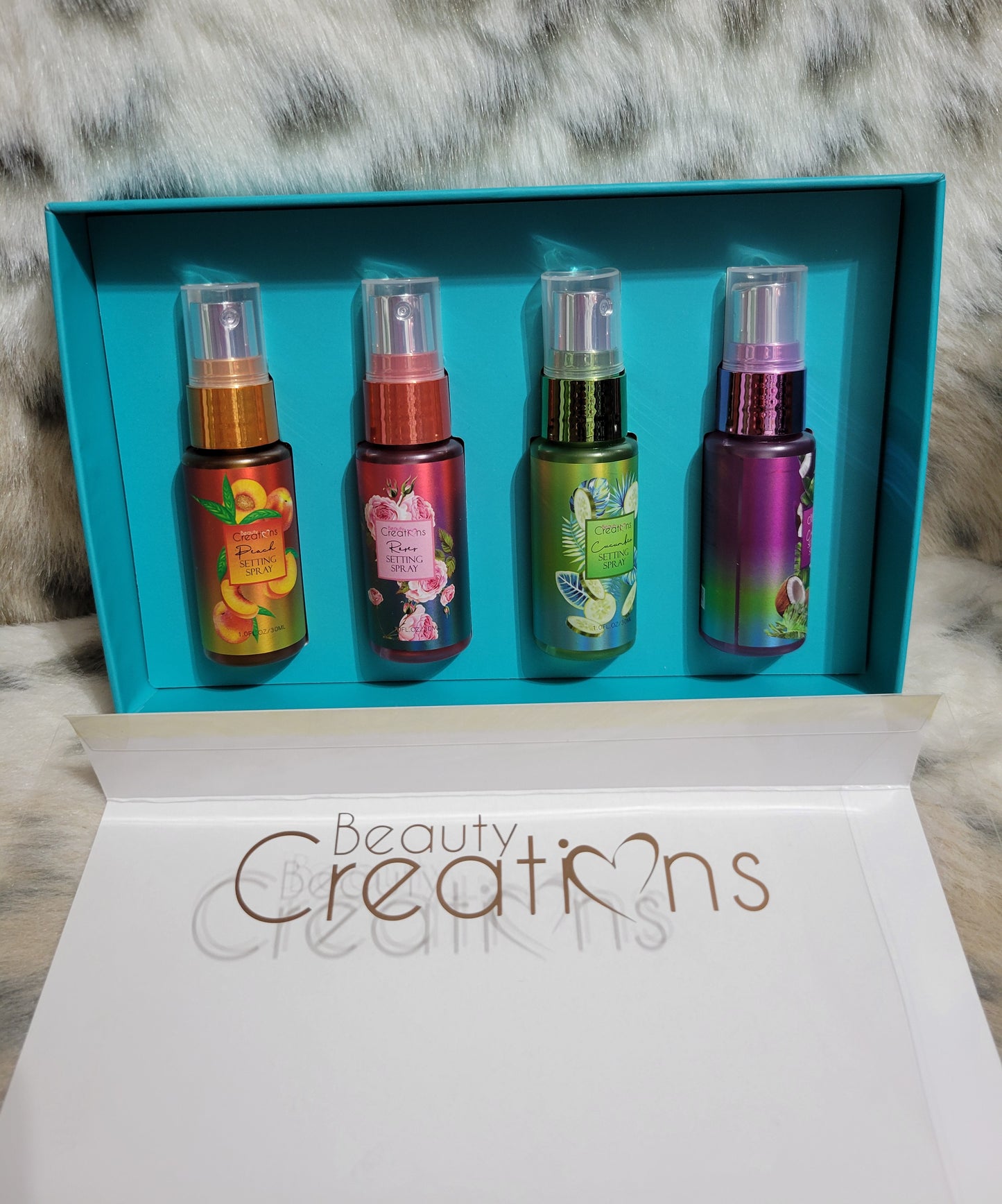 Beauty Creations Set of 4 setting spray minis.